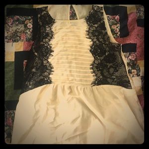 Cream and black blouse